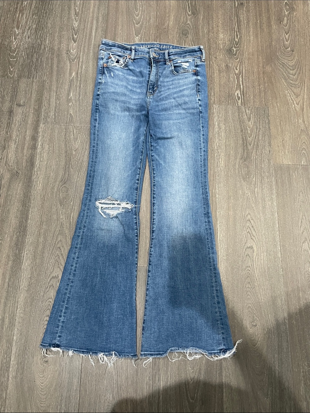 American Eagle Outfitters Light Blue Flare Jeans with Distressed Knee